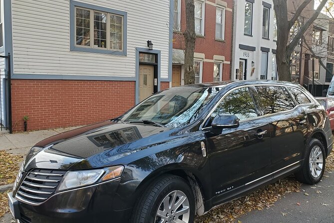 Curbside Sedan Transportation from O'Hare or Midway Airport to Downtown Chicago - Finding the Car Fast: Real-Time Communication at the Curb