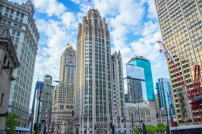 Magnificent Mile Tour With Optional 360 Chicago Upgrade - From upscale storefronts to the Esquire Theater vibe