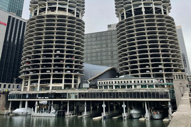 The Loop, River North and Chicago’s Theater District: A Self-Guided Audio Tour - Dusable Statue and the Wrigley Building: founder stories and office-block origins